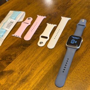 Apple Smartwatch with Blue, Pink, and White Bands